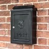 Deluxe Black "Tudor Rose” Wall Mounted Post Box -House Sign Discount Store black slimline modern letter box with tudor rose motif