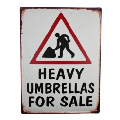"Heavy Umbrellas For Sale" Sign