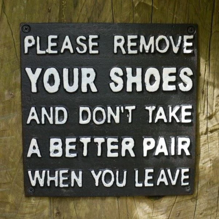 "Please Remove Your Shoes And Don't Take A Better Pair When You Leave" Cast Iron Sign