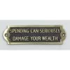 Spending Can Seriously Damage Your Wealth -House Sign Discount Store spending can seriously damage your health 3