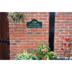 Green Traditional House Name Signs -House Sign Discount Store traditional green house sign with brass letters on wall
