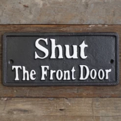 "Shut The Front Door " Cast Iron Sign
