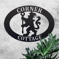 Lion & Staff Iron Oval House Name Sign