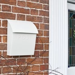 Cream Contemporary Post Box With Lock -House Sign Discount Store white contemporary postbox in situ on a brick wall